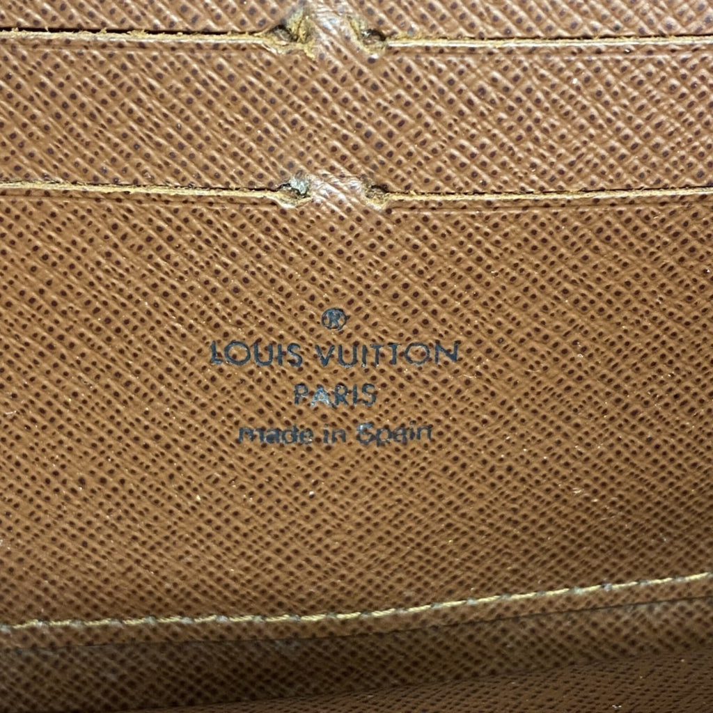 Zippy Wallet Monogram Canvas