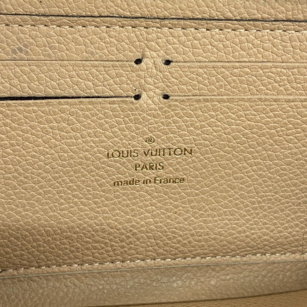 Clemence Wallet Monogram Empreinte Leather