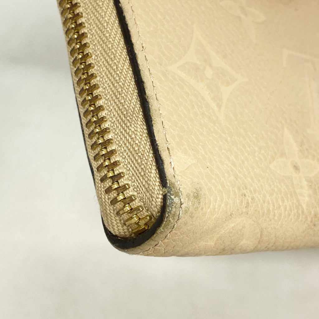 Clemence Wallet Monogram Empreinte Leather