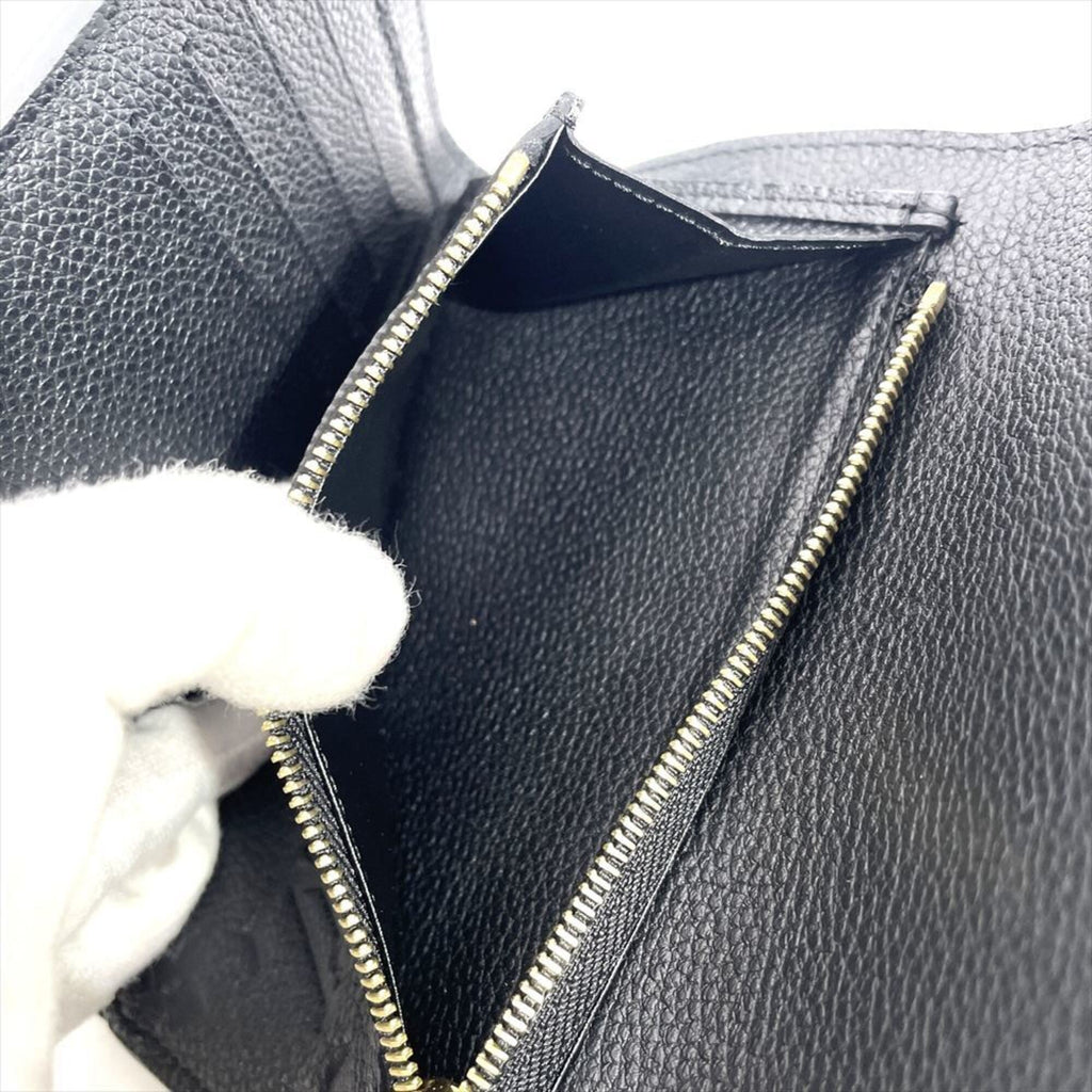 Curieuse Wallet Monogram Empreinte Leather