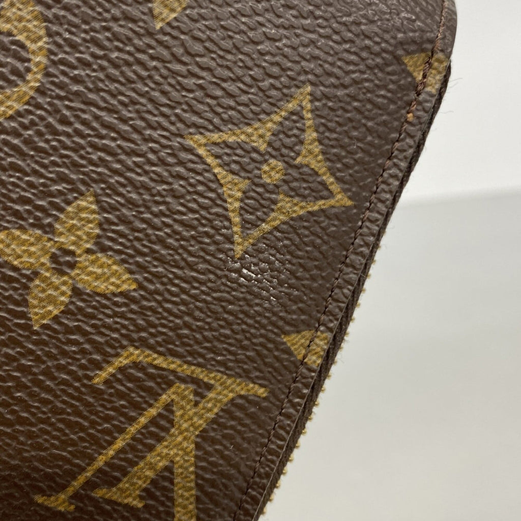 Zippy Wallet Monogram Canvas