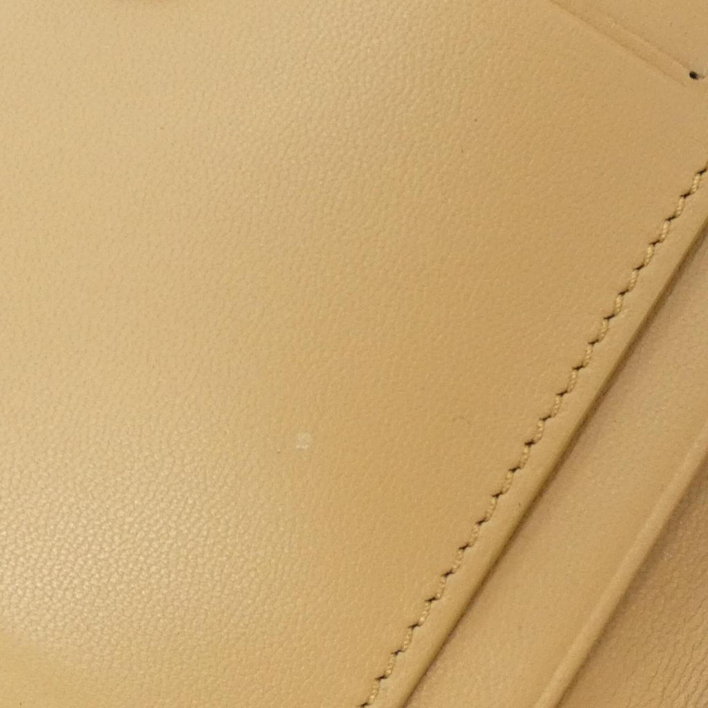 Baguette Continental Wallet Zucca Embossed Leather