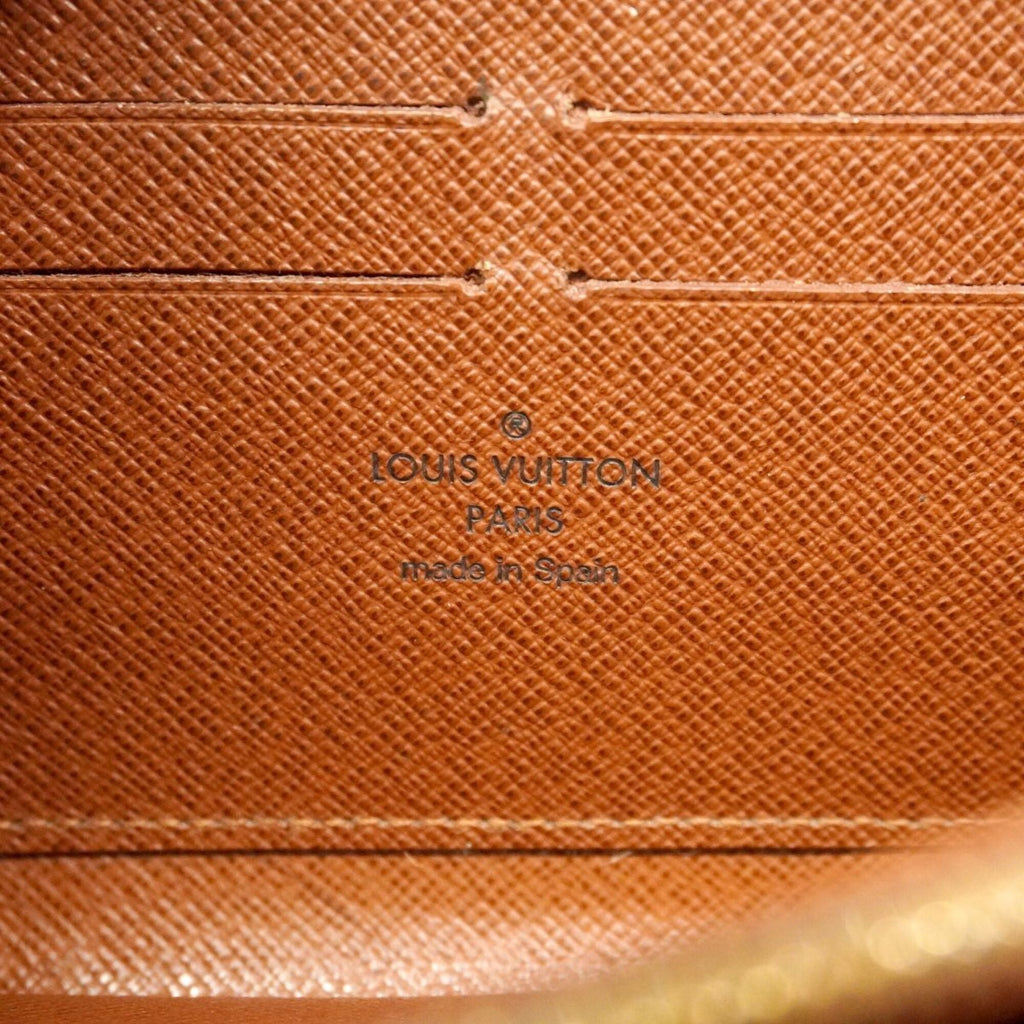 Zippy Wallet Monogram Canvas