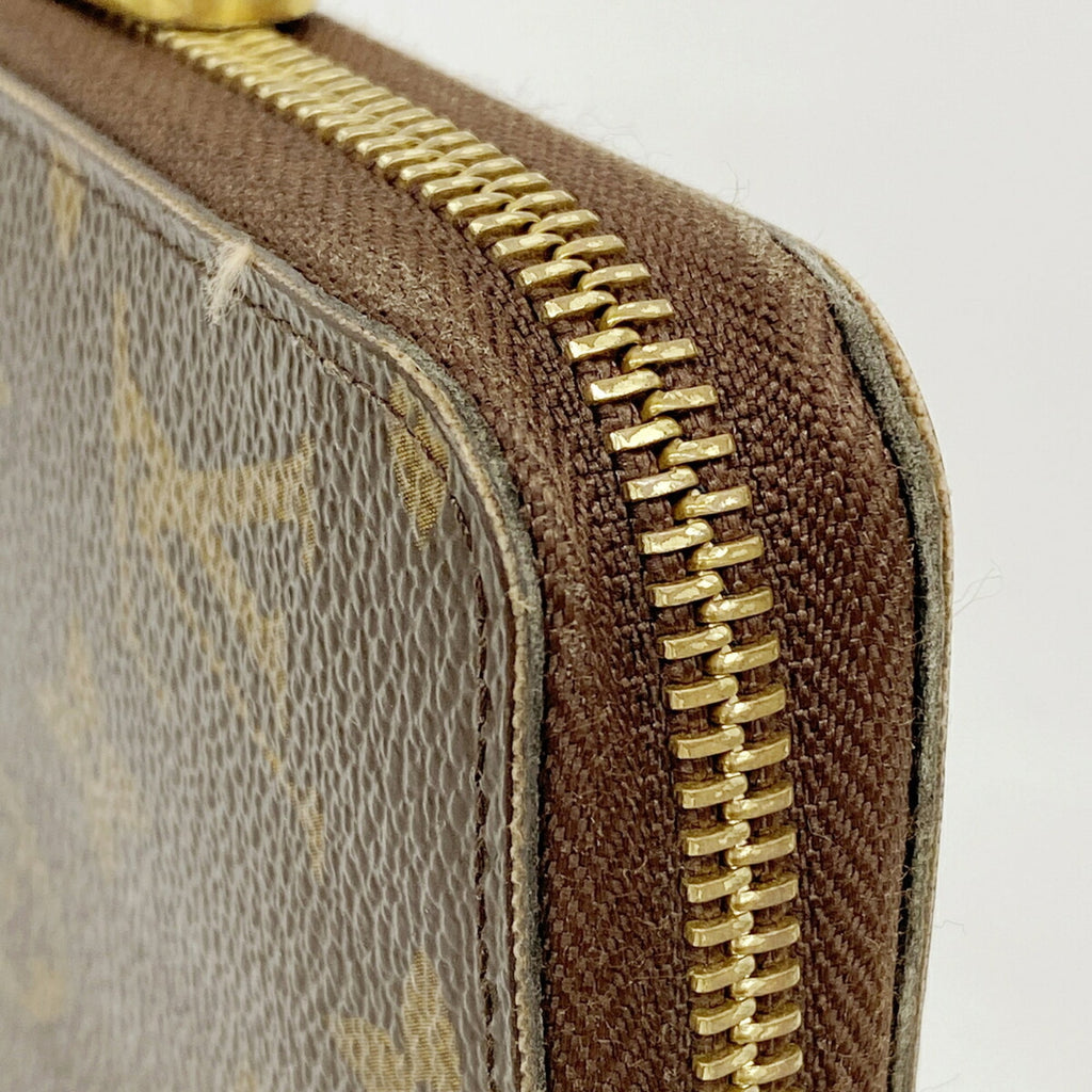 Zippy Wallet Monogram Canvas