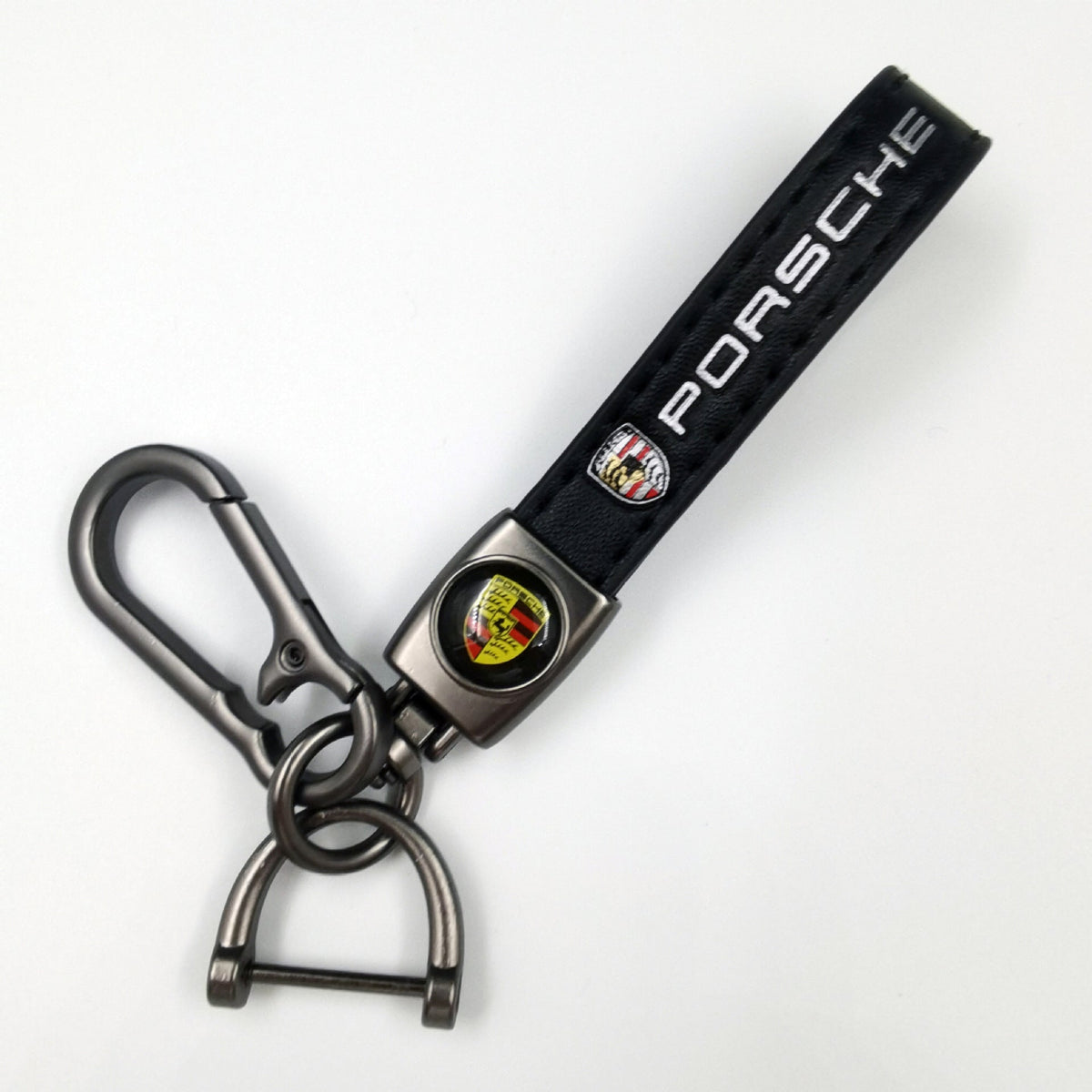 Sleek Black Leather Keychain with Eye-Catching Emblem & Secure Carabiner